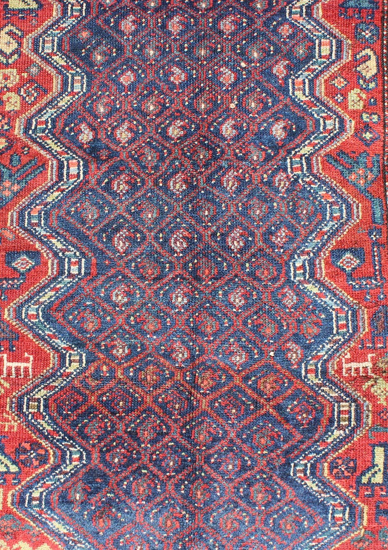 Blue Background Antique N.W. Persian Rug with Zig-Zag Field and Tribal Motifs In Good Condition For Sale In Atlanta, GA