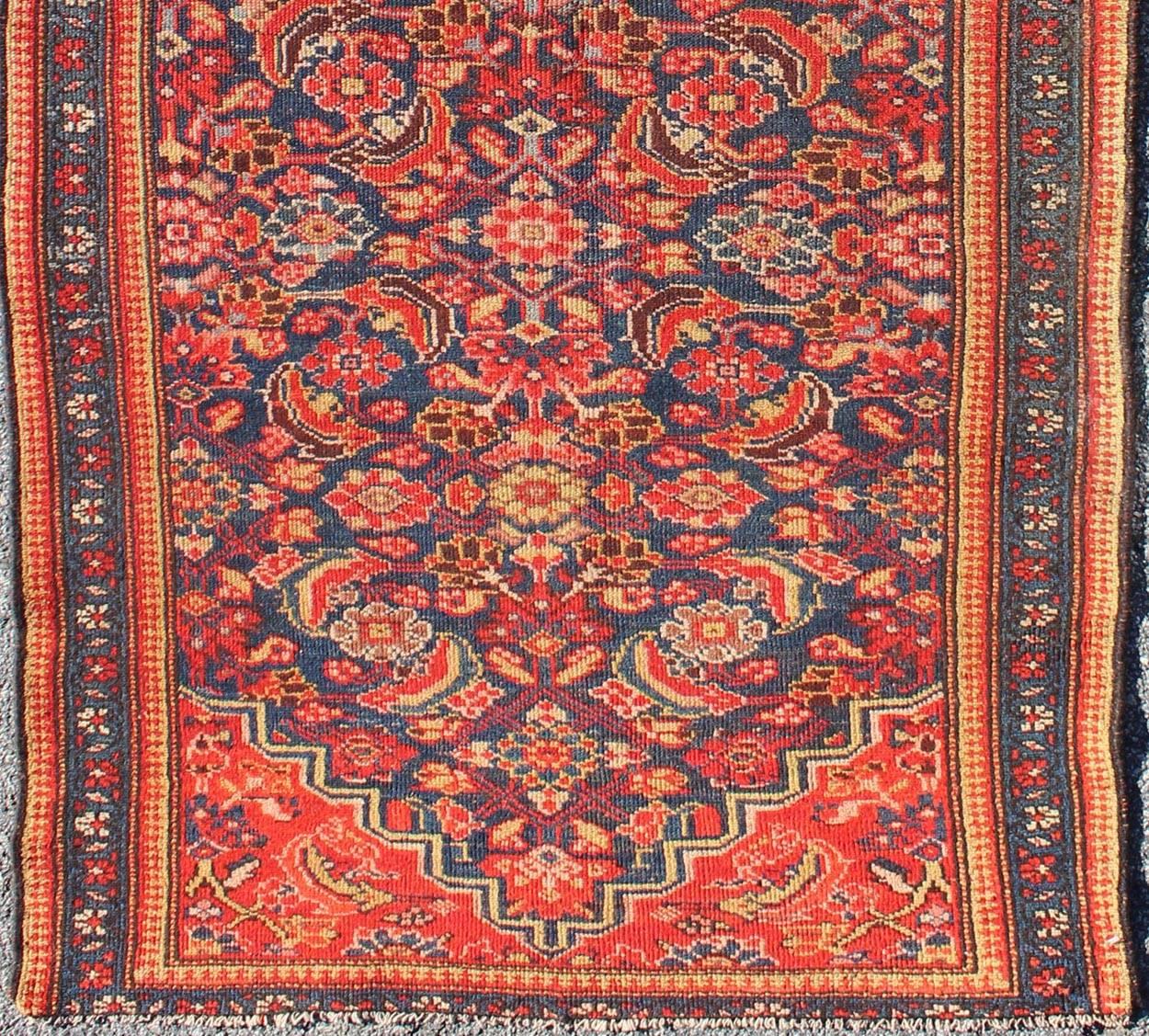 Red and Blue Antique Persian Malayer Rug with All-Over Floral Design, rug 13-1102, country of origin / type: Iran / Malayer, circa 1920

This antique Persian Malayer runner from early 20th century Iran (circa 1920) features an all-over floral