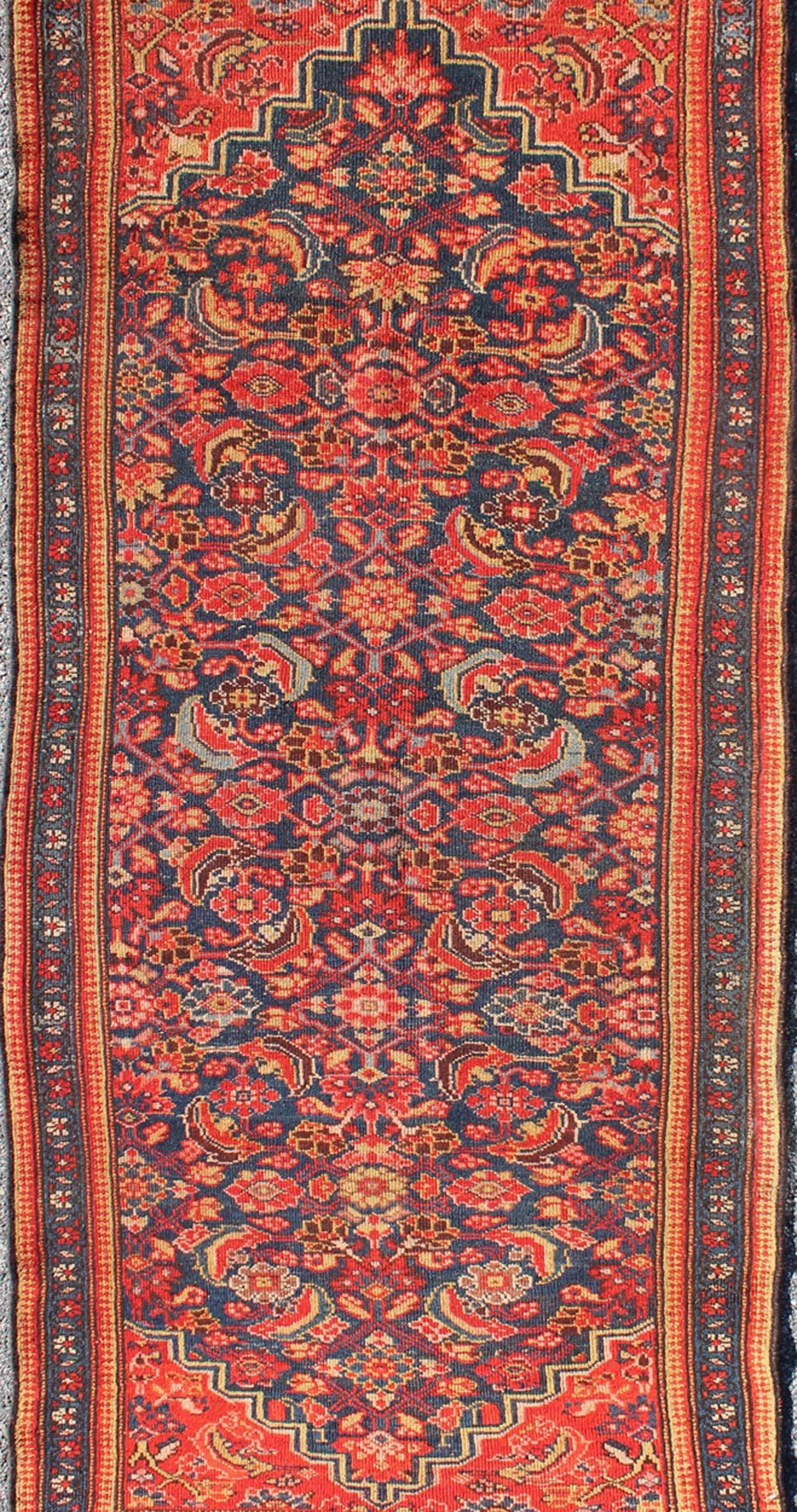 Red and Blue Antique Persian Malayer Rug with All-Over Floral Design In Excellent Condition For Sale In Atlanta, GA