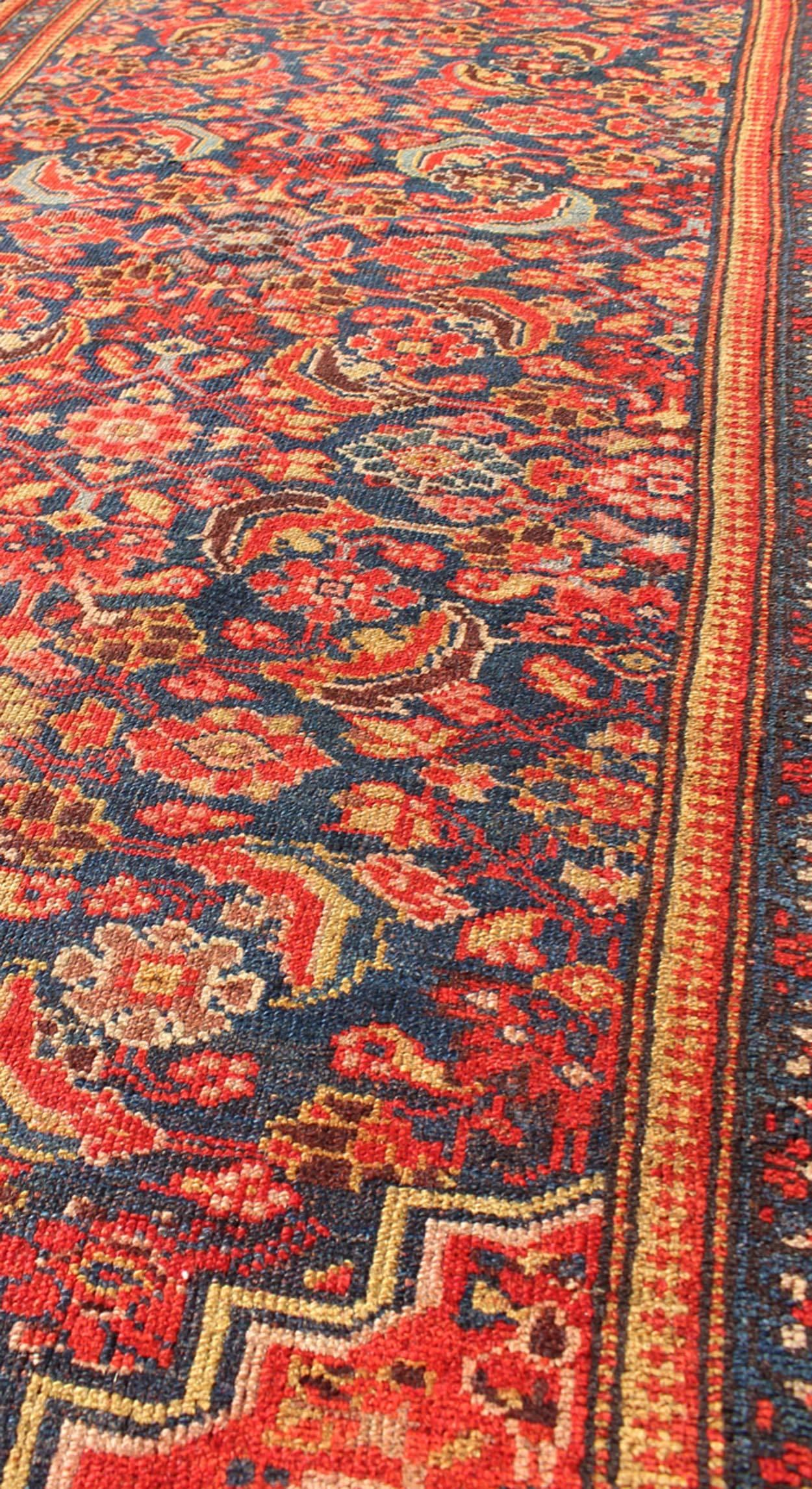 Early 20th Century Red and Blue Antique Persian Malayer Rug with All-Over Floral Design For Sale
