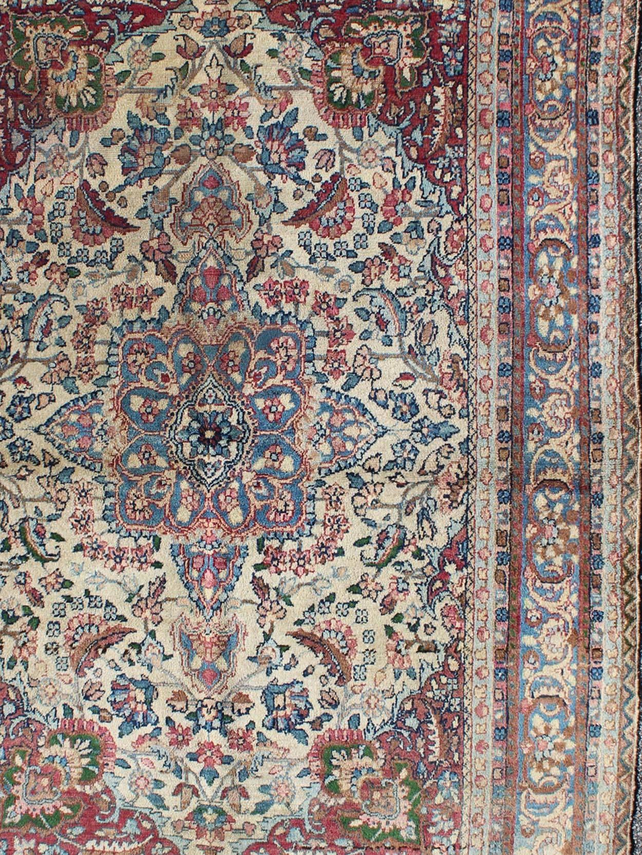 Kirman Detailed Antique Persian Lavar Kerman Rug with Floral Design in Ivory Background For Sale