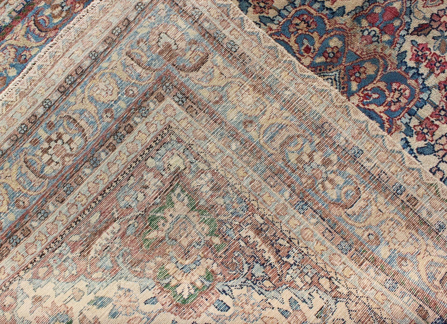 Detailed Antique Persian Lavar Kerman Rug with Floral Design in Ivory Background In Excellent Condition For Sale In Atlanta, GA