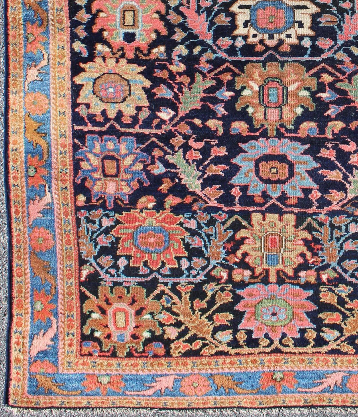 Pastel colored Persian Hamedan antique rug with large floral motifs, rug ema-7526, country of origin / type: Iran / Hamadan, circa 1910

This beautiful antique early 20th century Persian Hamadan carpet features an all-over design of repeating