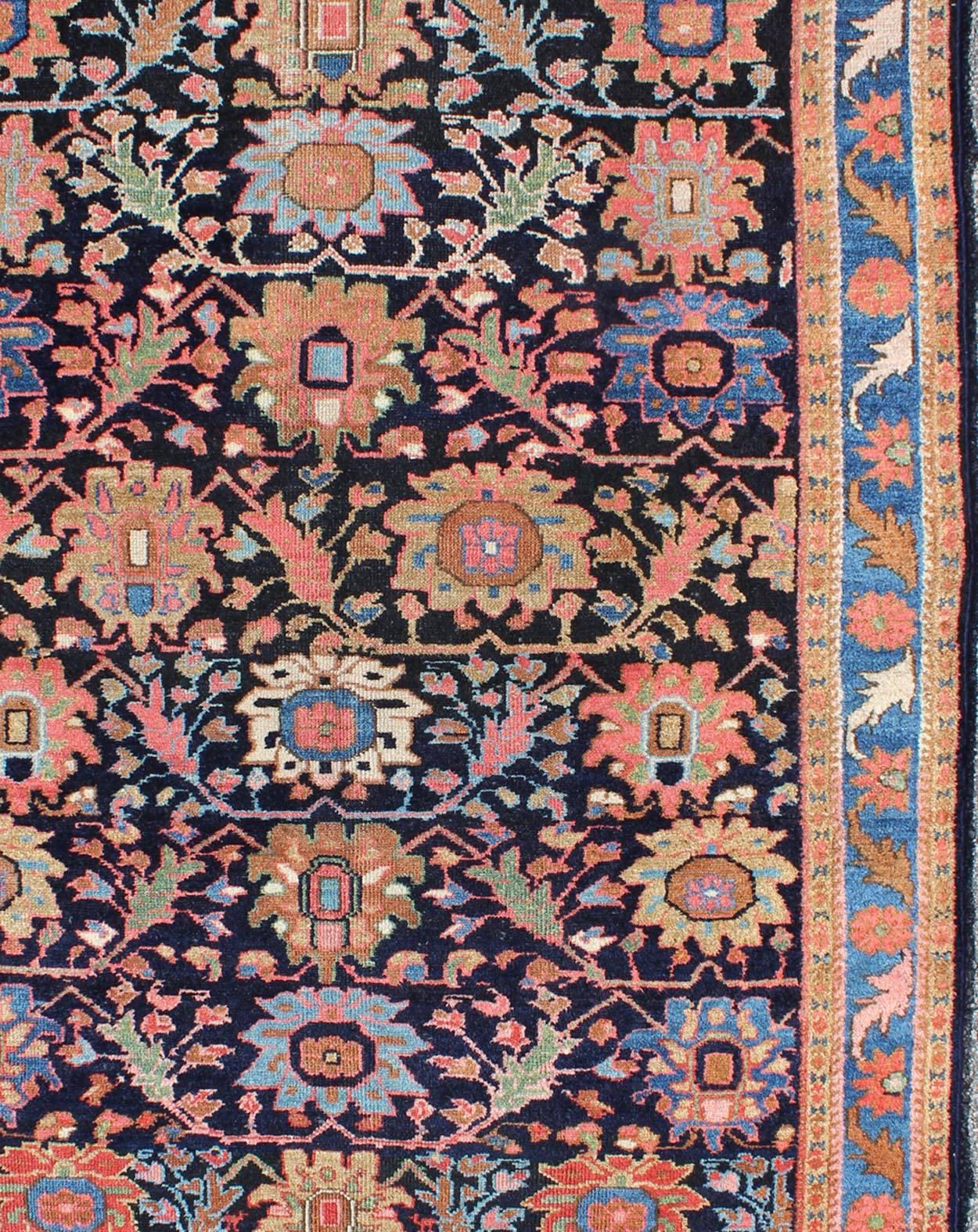 Antique Persian Malayer Rug with Large Floral Motifs in Navy and Multi Colors In Excellent Condition For Sale In Atlanta, GA
