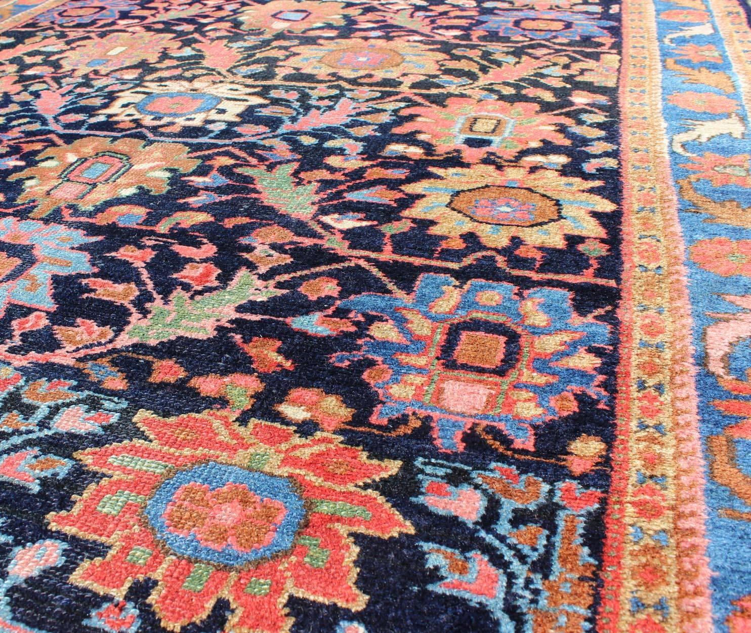 Early 20th Century Antique Persian Malayer Rug with Large Floral Motifs in Navy and Multi Colors For Sale