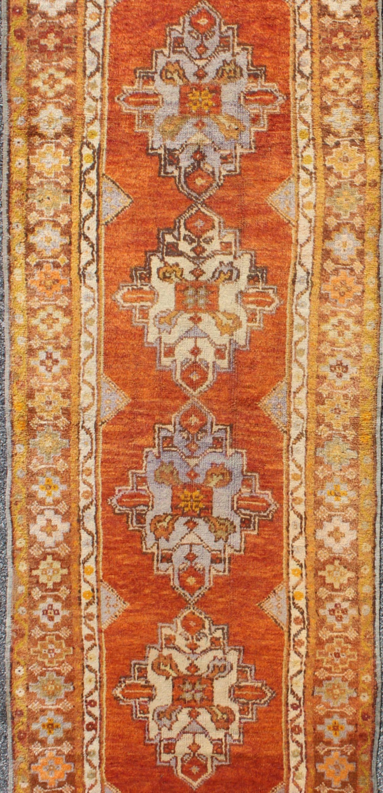 Hand-Knotted Antique Turkish Oushak Runner with Geometric Diamond Medallions For Sale