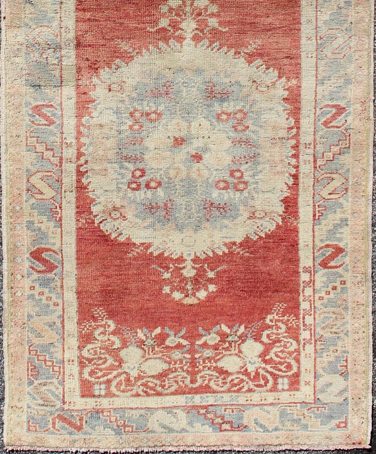 Vintage Turkish Oushak runner with three floral medallions in red, ivory, grey, rug en-328, country of origin / type: Turkey / Oushak, circa 1930

This beautiful vintage Oushak runner from 1930s Turkey features a Classic Oushak design, which is