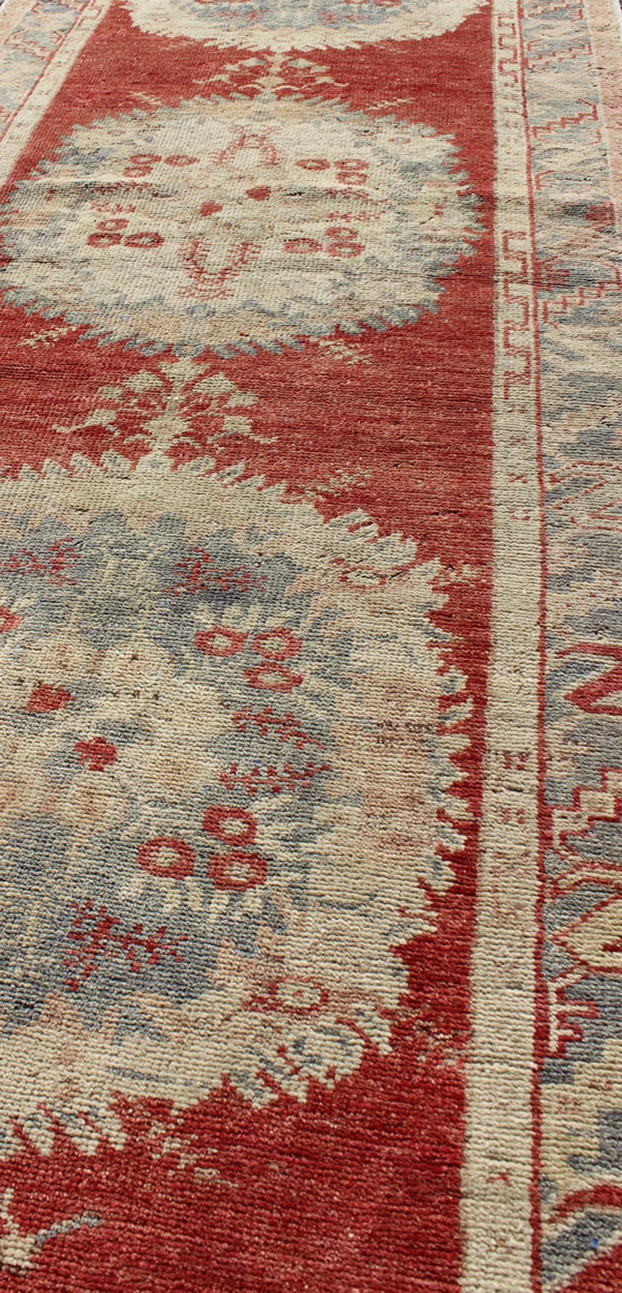 Mid-20th Century Vintage Turkish Oushak Runner with Three Floral Medallions in Red, Ivory, Grey