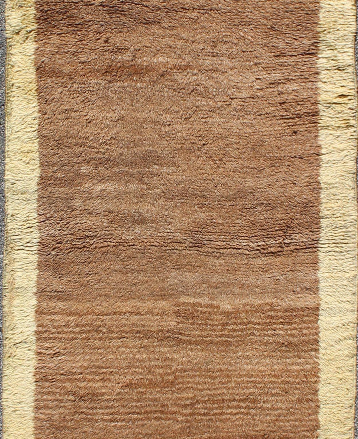 Mid-Century Modern Turkish Tulu Rug with Open Brown Field and Cream Border In Excellent Condition In Atlanta, GA