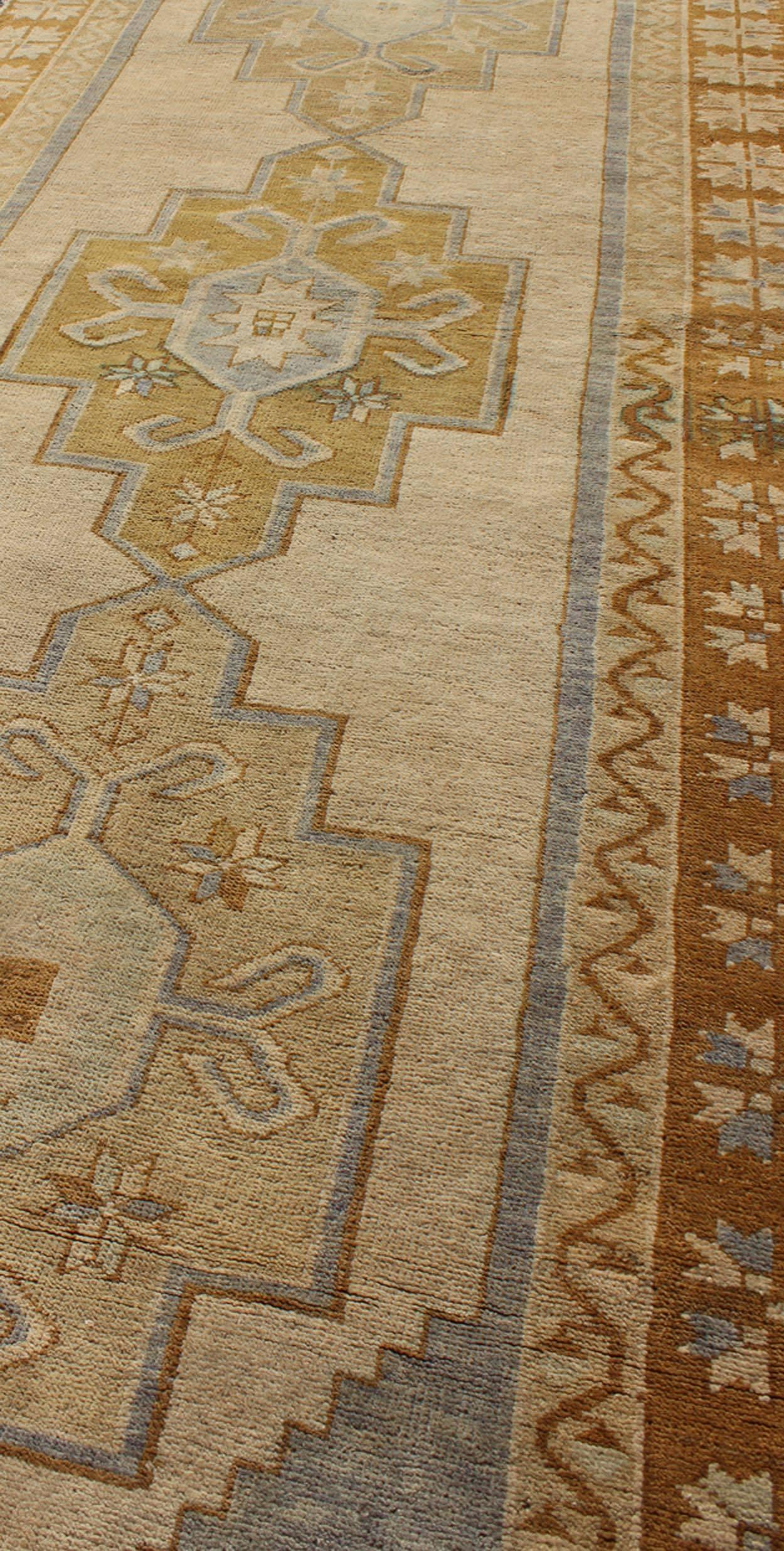 Mid-20th Century Chartreuse, Taupe and Ivory Vintage Turkish Oushak Runner with Three Medallions