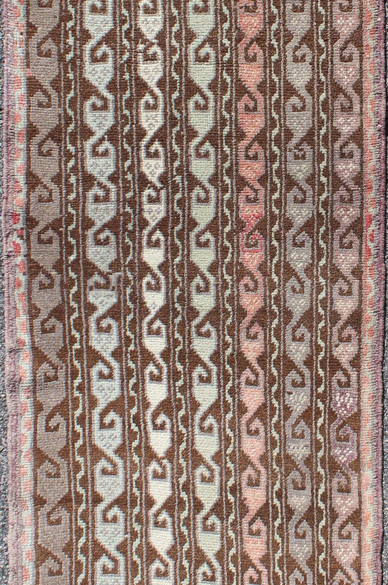 Hand-Knotted Brown and Pastel-Colored Vintage Turkish Oushak Runner with Vining Geometrics For Sale