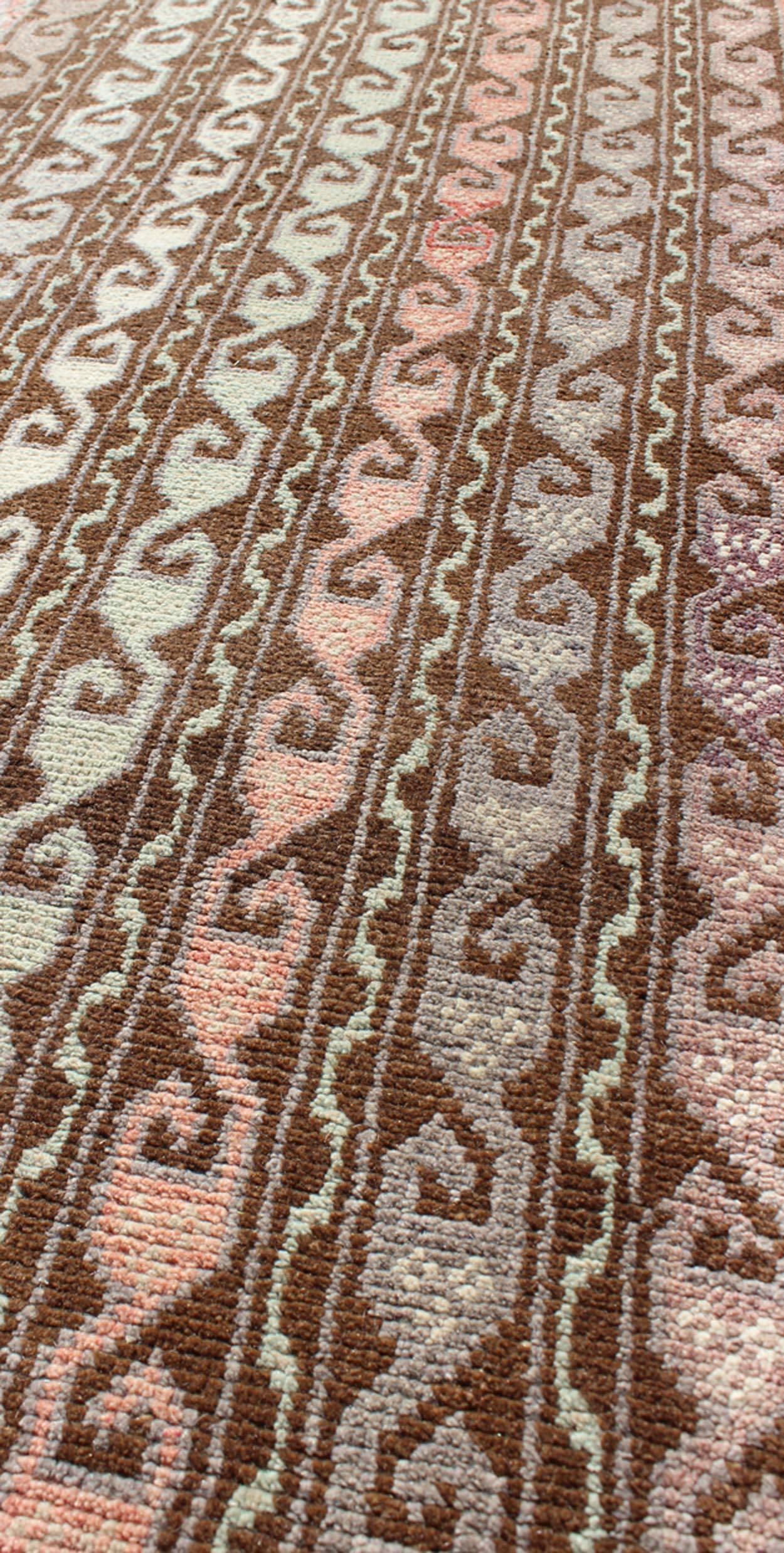 Mid-20th Century Brown and Pastel-Colored Vintage Turkish Oushak Runner with Vining Geometrics For Sale