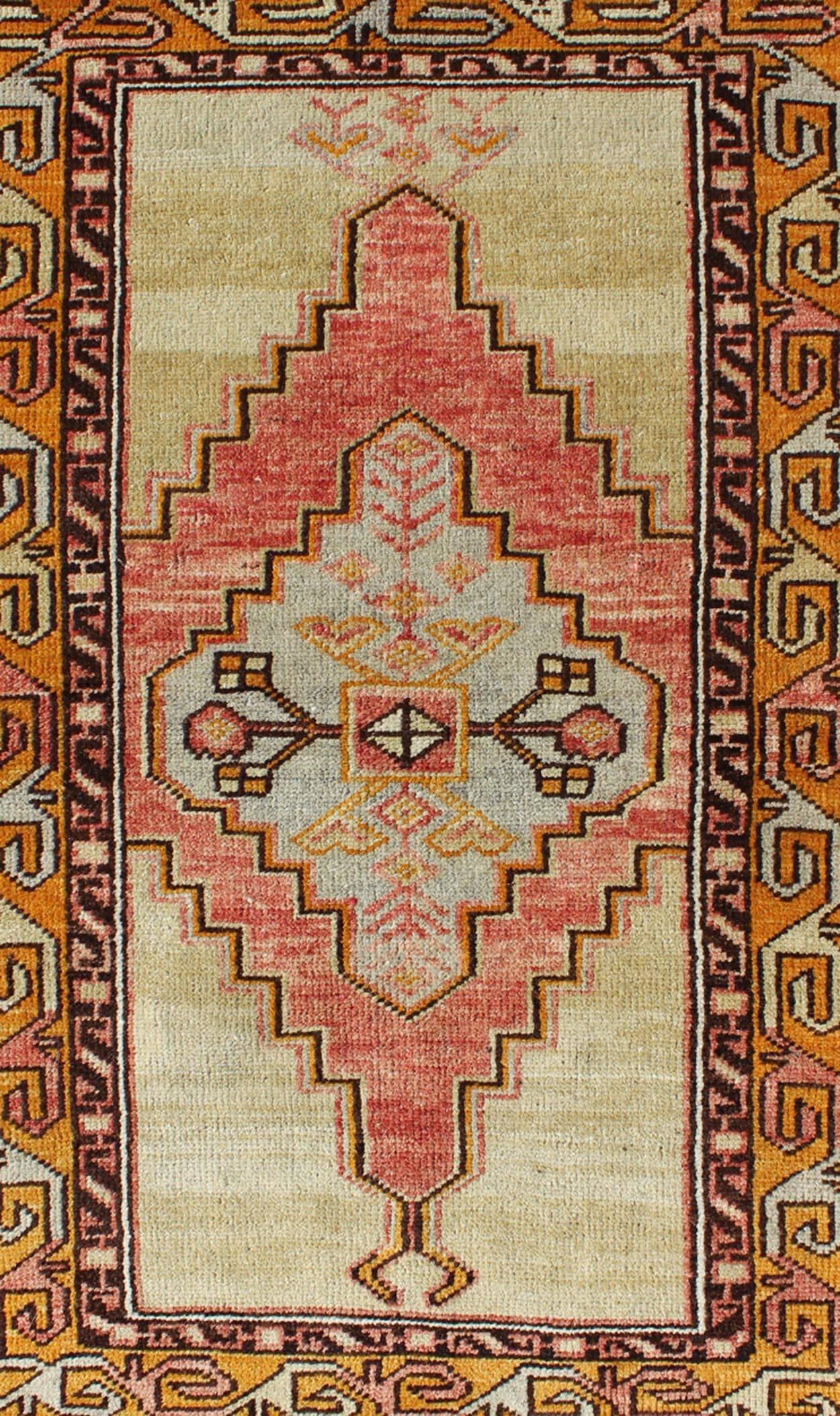 Hand-Knotted Colorful Stylized Antique Turkish Oushak Rug with Layered Tribal Medallion For Sale