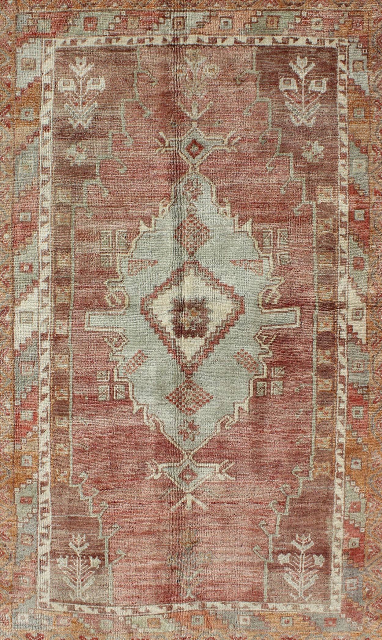 Hand-Knotted Colorful Tribal Vintage Turkish Oushak Rug with Central Medallion Design