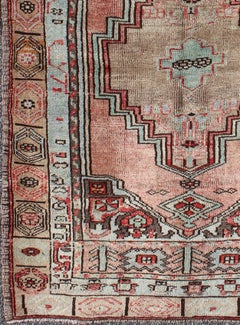 Salmon and Pink Vintage Turkish Oushak Rug with Tribal Medallion Design
