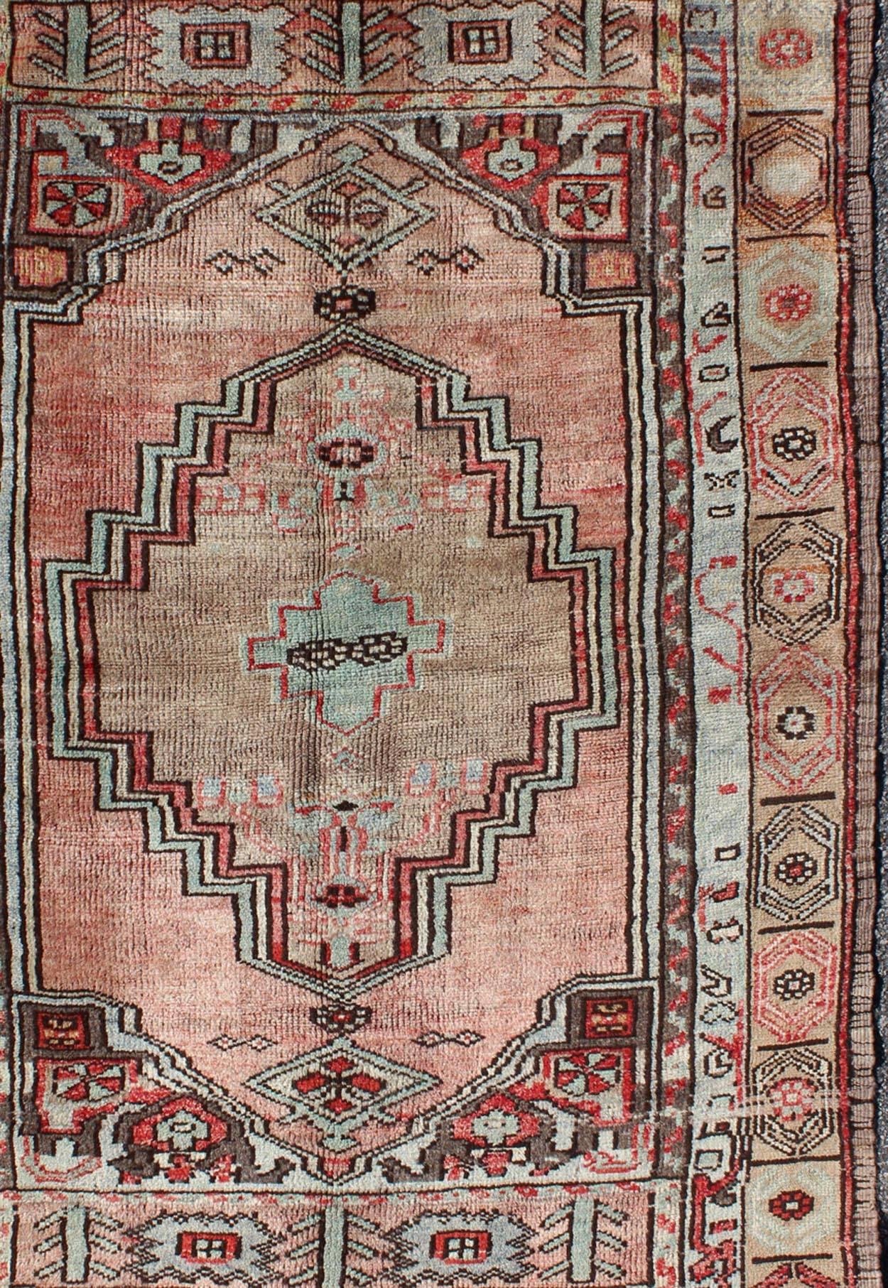 Salmon and Pink Vintage Turkish Oushak Rug with Tribal Medallion Design In Excellent Condition For Sale In Atlanta, GA