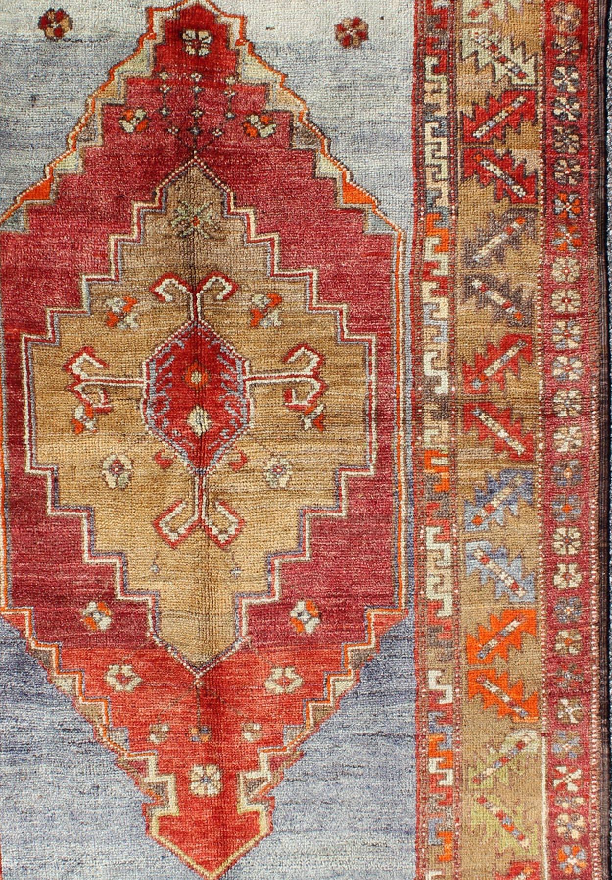 Multicolored Vintage Turkish Oushak Rug in Red, Blue and Soft Orange Colors In Excellent Condition In Atlanta, GA
