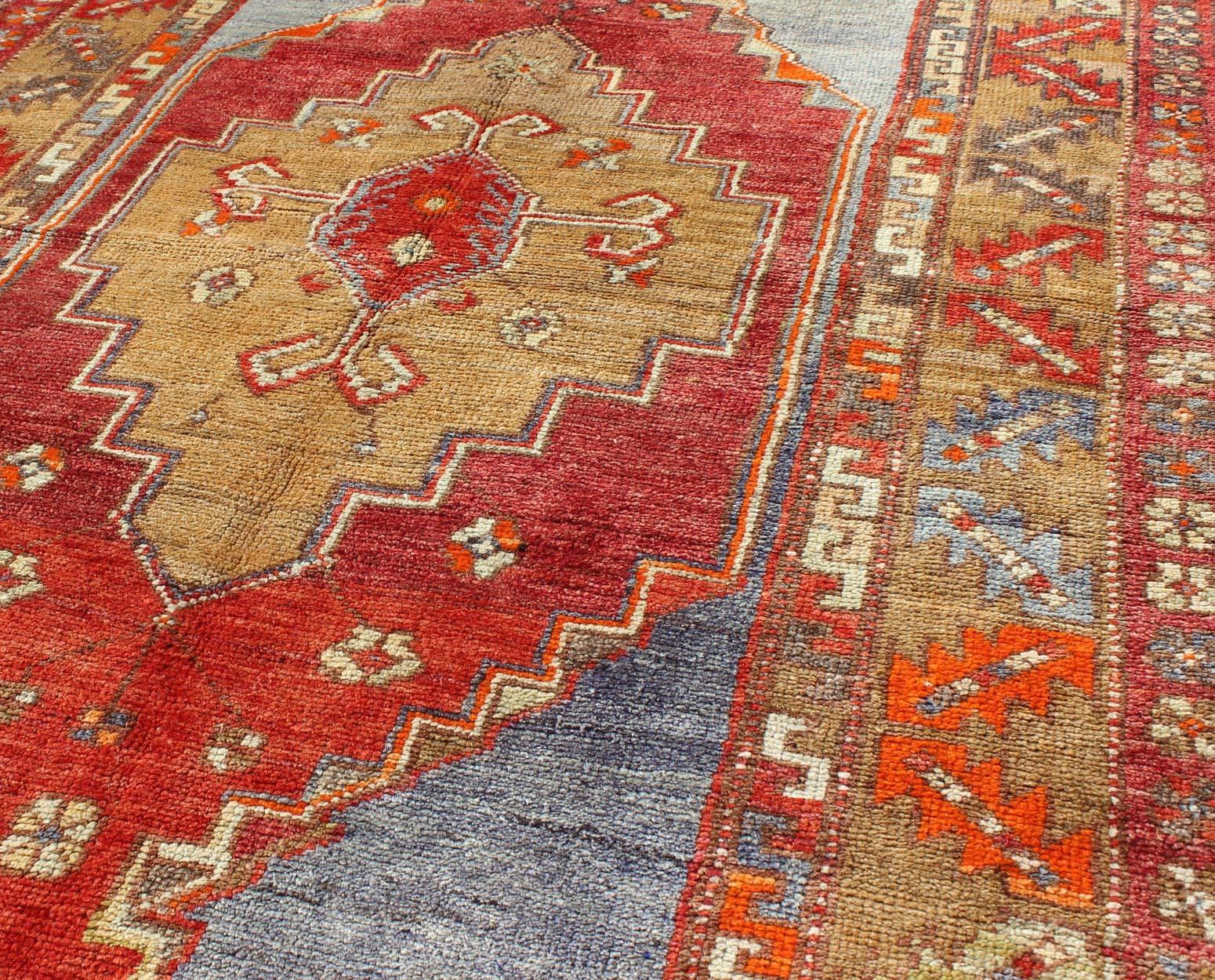 Mid-20th Century Multicolored Vintage Turkish Oushak Rug in Red, Blue and Soft Orange Colors