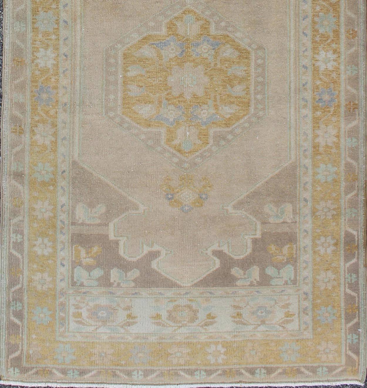  vintage Turkish Oushak runner with floral medallions, rug en-140350, country of origin / type: Turkey / Oushak, circa 1940.

This vintage Oushak runner features a unique blend of cheerful colors and an intricately beautiful design. The floral