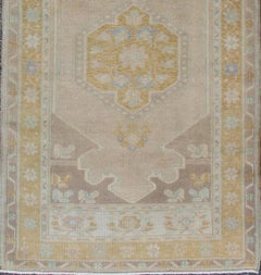 Turkish Oushak Runner with Faded Taupe Field and Pale Gold, Sky Blue, and Ivory