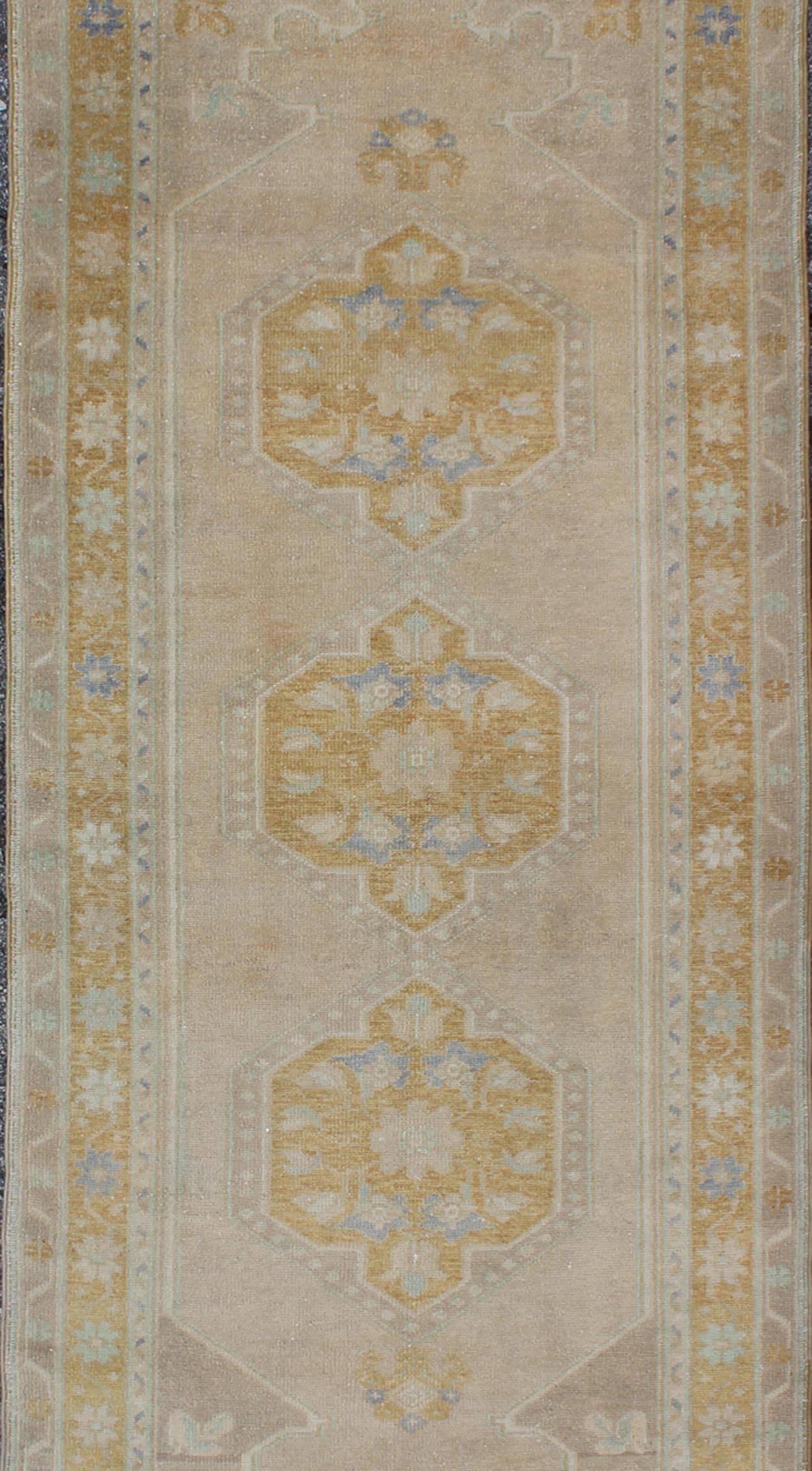 Hand-Knotted  Vintage Turkish Oushak Runner with Floral Medallions For Sale