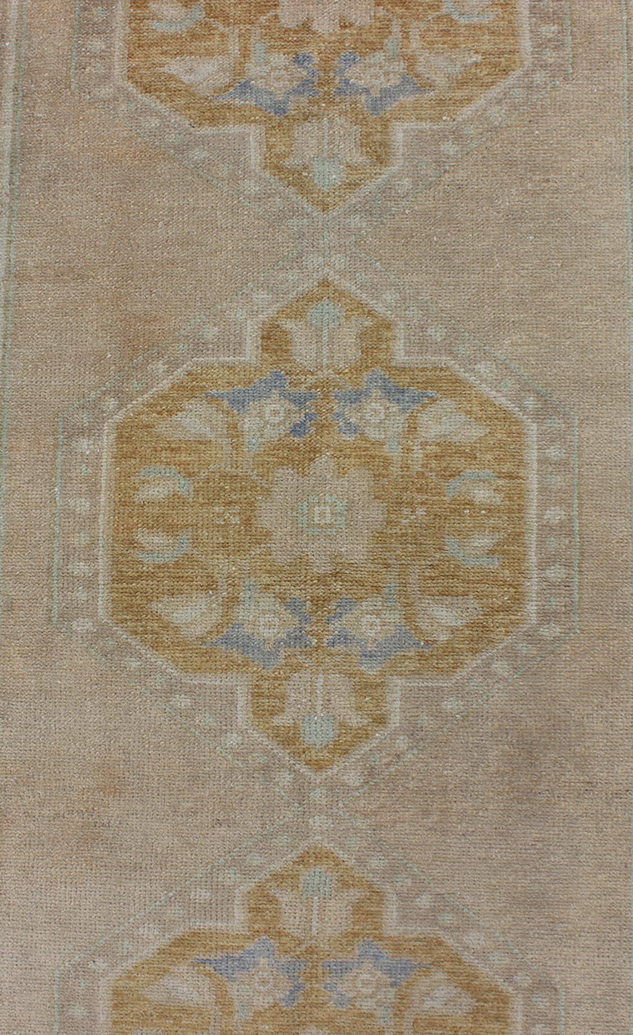 Wool  Vintage Turkish Oushak Runner with Floral Medallions For Sale