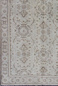 Hand Knotted All-Over Design Vintage Turkish Oushak Rug in Shades of Cream