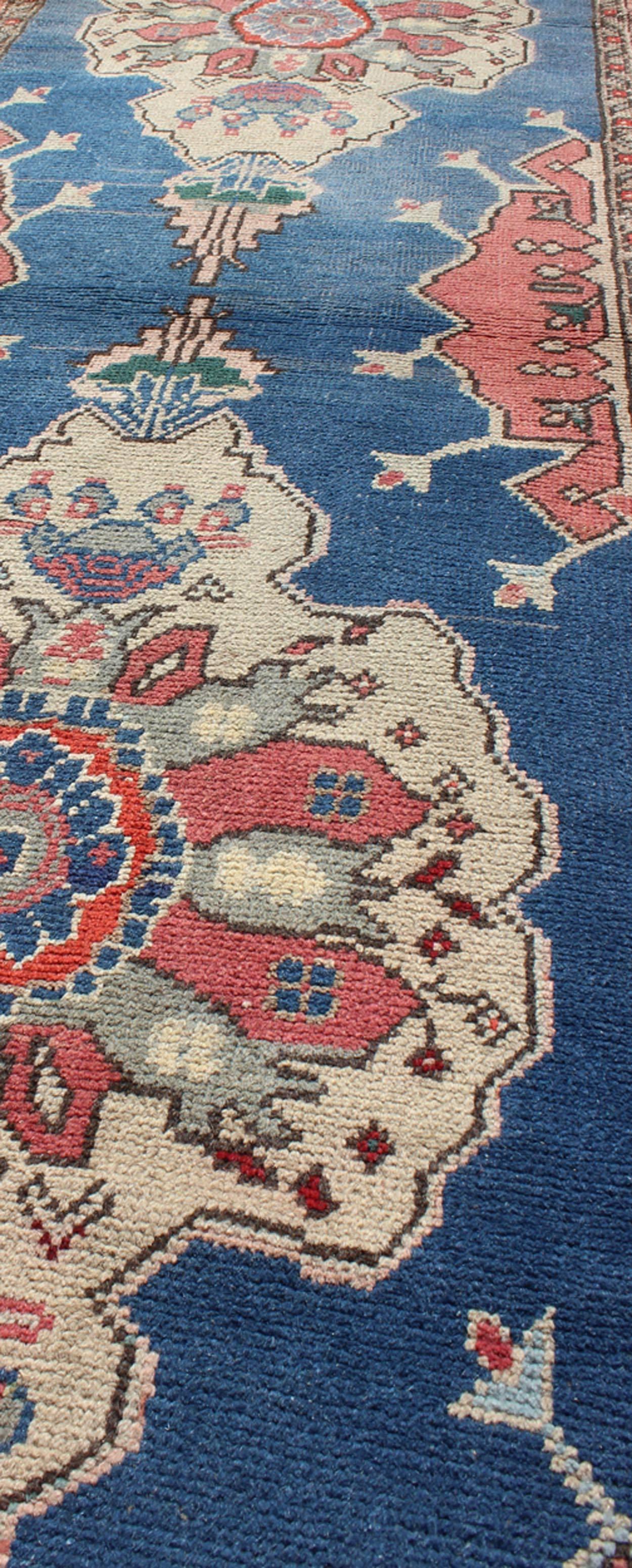 Grand Dual Medallion Oushak Vintage Runner from Turkey in Red and Blue In Excellent Condition For Sale In Atlanta, GA
