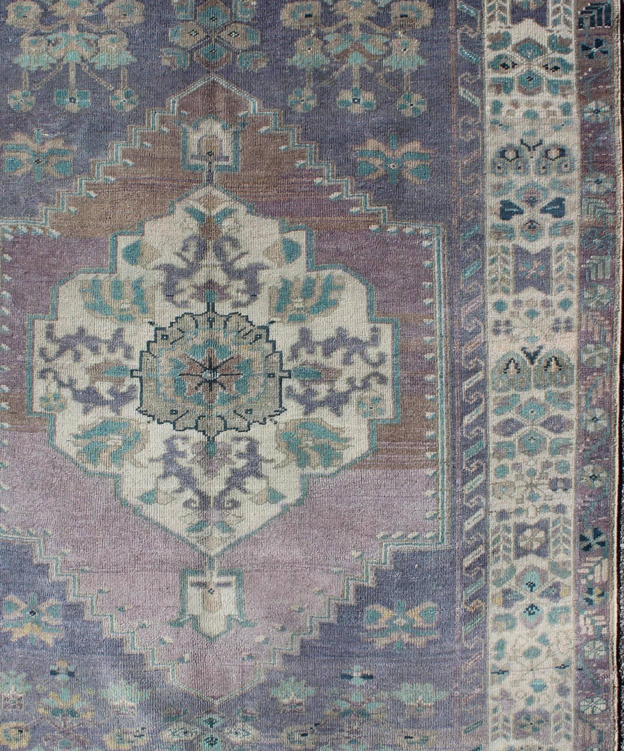 purple and teal rug