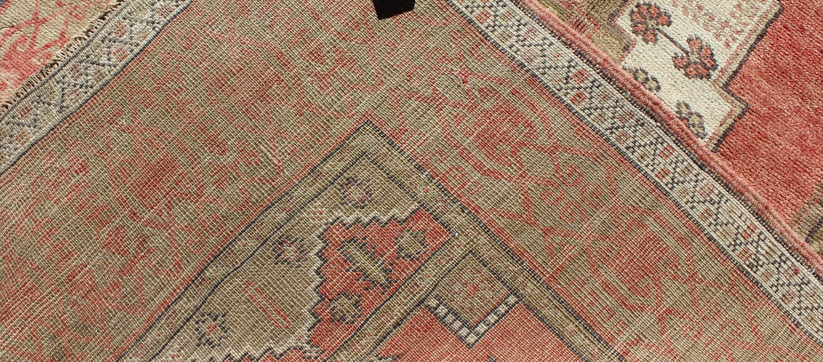 Hand-Knotted Olive Green and Red Oushak Vintage Turkish Rug with Tribal Medallion Design For Sale