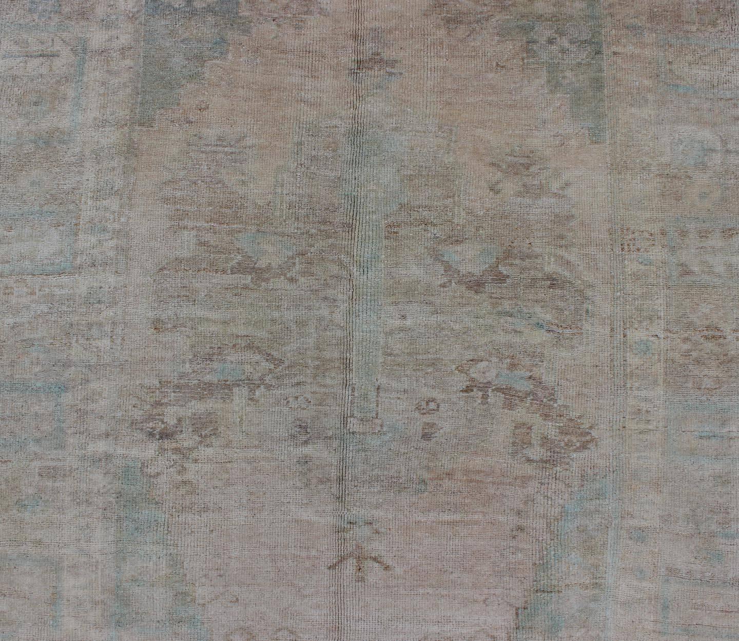 Mid-20th Century Pale Color Vintage Turkish Oushak Rug With Layered Medallion in Teal, Taupe