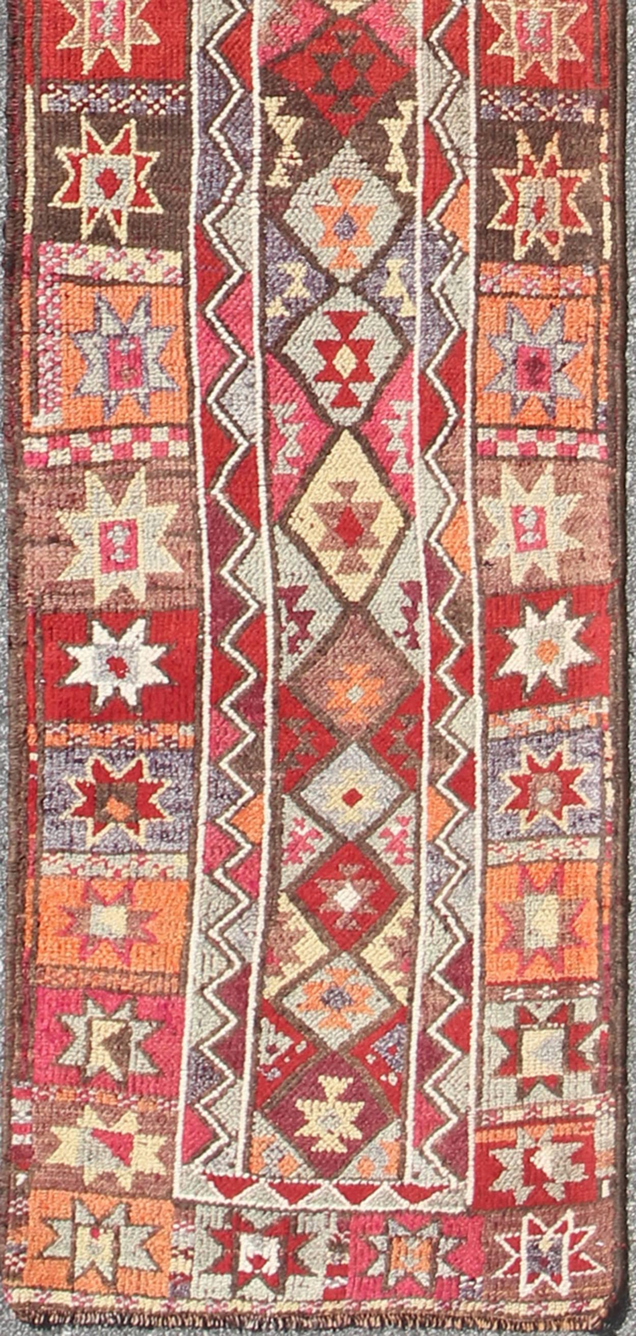 Multicolored Midcentury Turkish Kurdish Oushak runner with diamonds and Stars, rug en-165398, country of origin / type: Iran / Kurdish Oushak, circa 1950

This Kurdish tribal rug was woven by Kurdish weavers in western Persia. The emphasis with