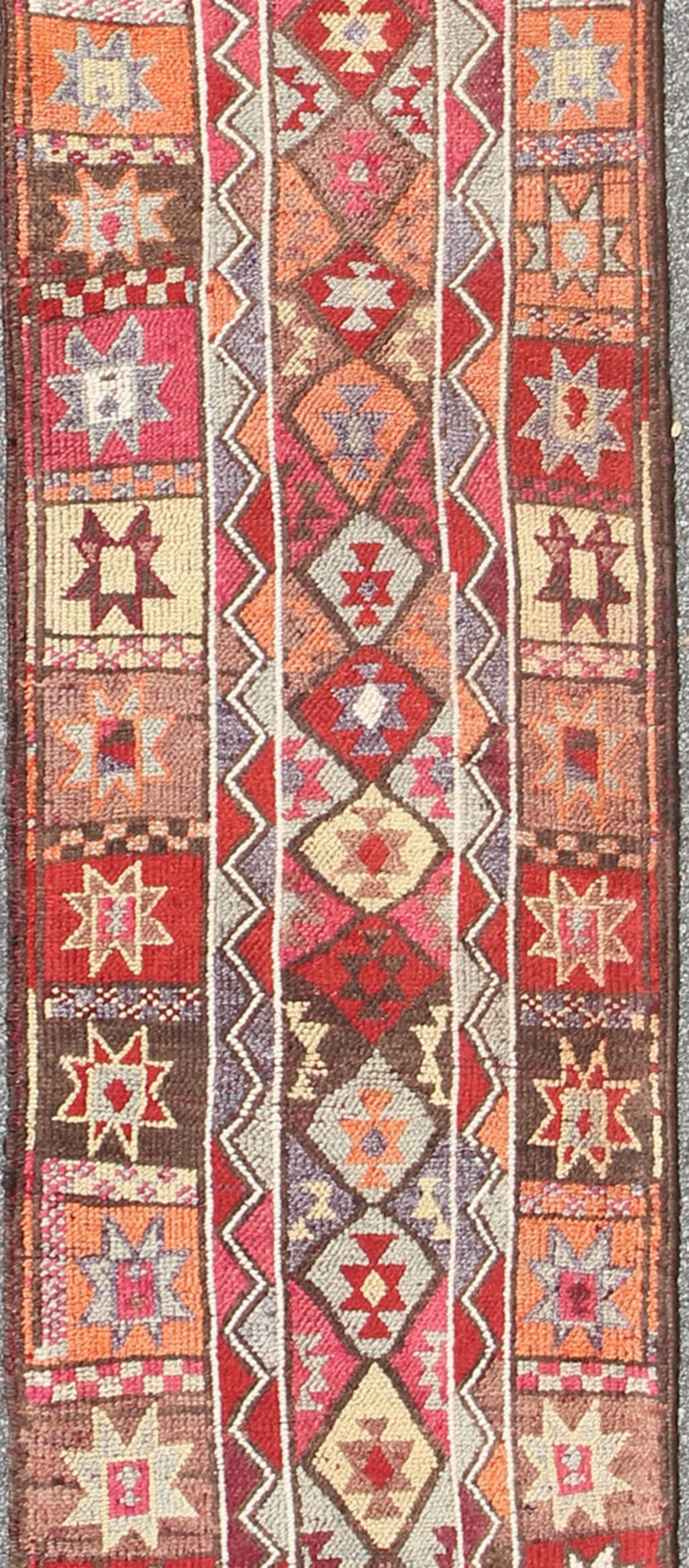 Hand-Knotted Multicolored Midcentury Turkish Kurdish Oushak Runner with Diamonds and Stars For Sale