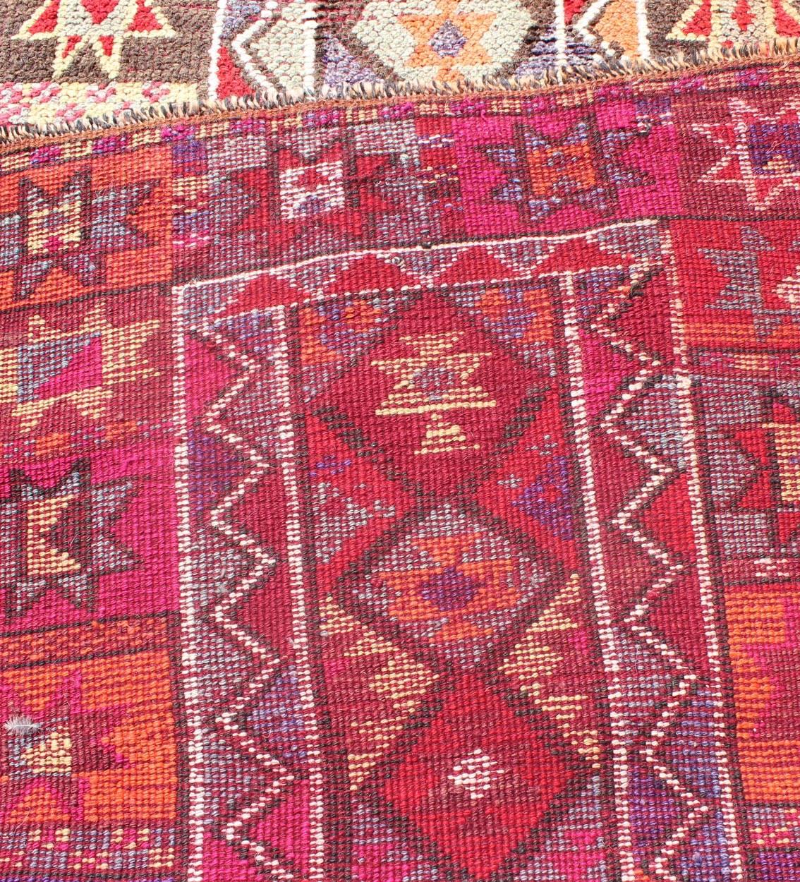 Multicolored Midcentury Turkish Kurdish Oushak Runner with Diamonds and Stars For Sale 1