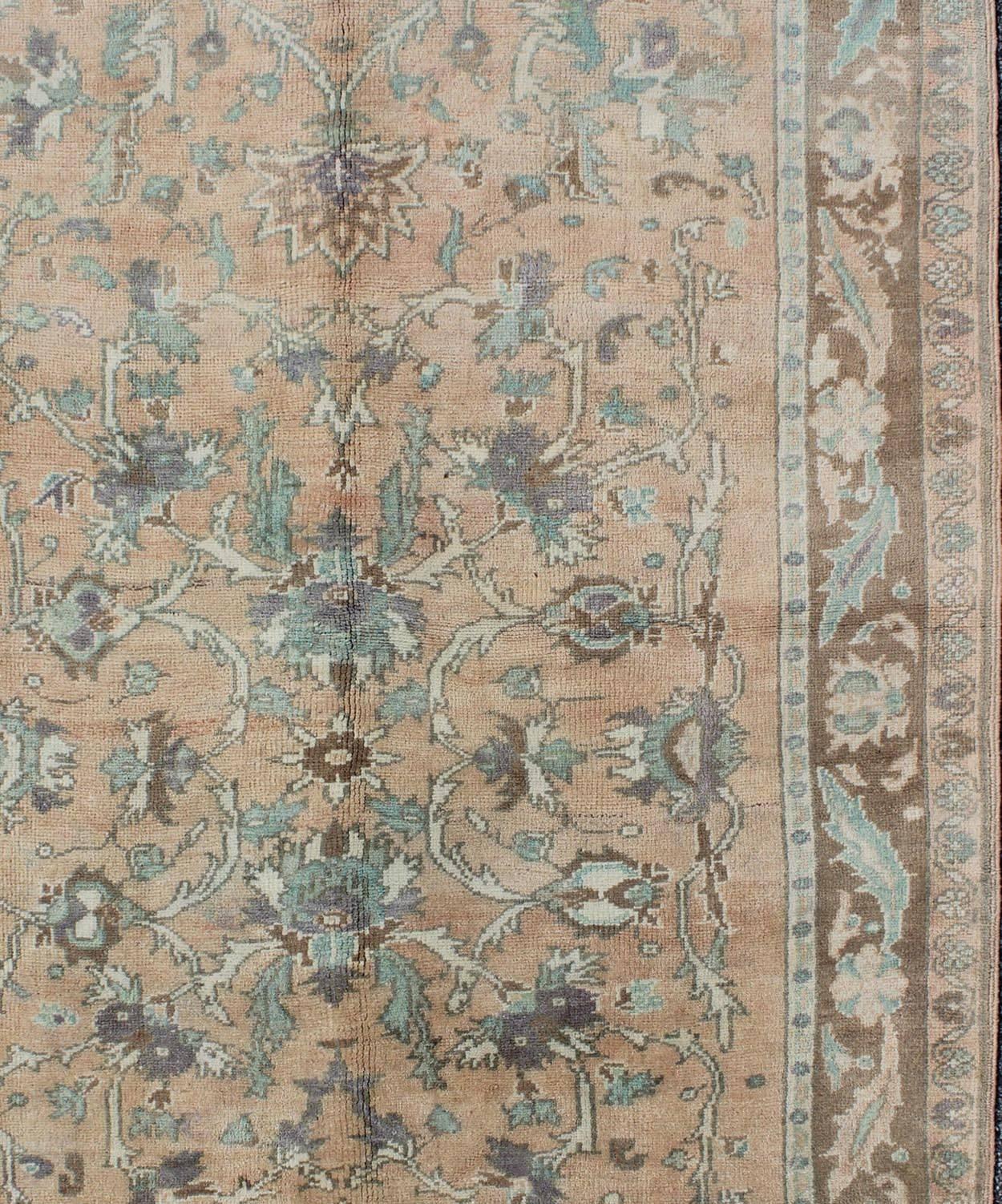 Hand-Knotted Elegant Floral Vintage Turkish Oushak Rug in Cream, Green, Light Peach and Brown For Sale