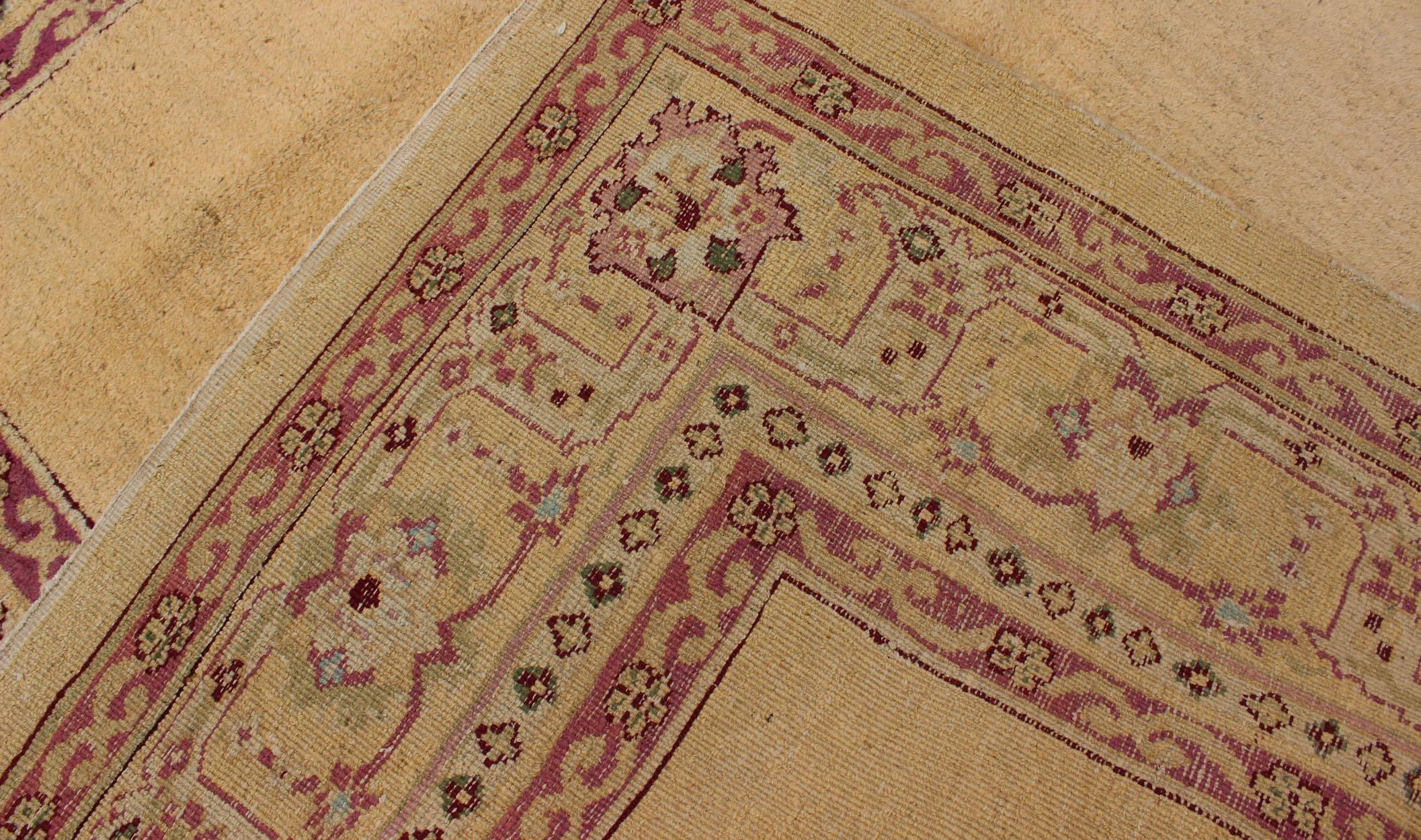 20th Century Antique Indian Amritsar Rug with Cream Background, Red & Lavender Border