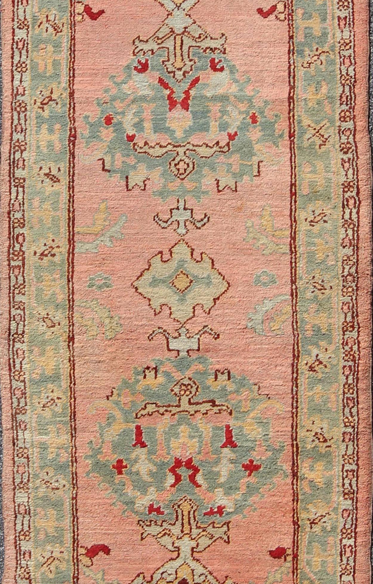 Salmon Pink Antique Turkish Oushak Runner with Stylized Floral Medallion Design In Excellent Condition For Sale In Atlanta, GA