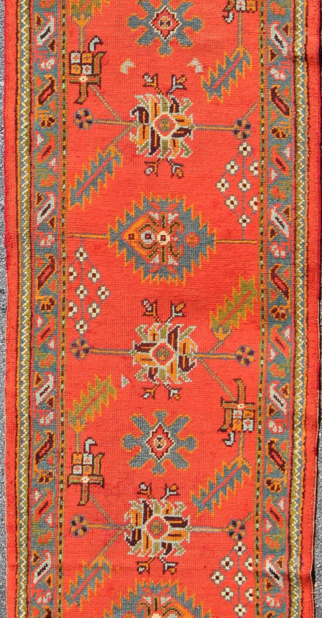 Hand-Knotted Bright Red Antique Turkish Oushak Runner with Sub-Geometric Tribal Motifs For Sale