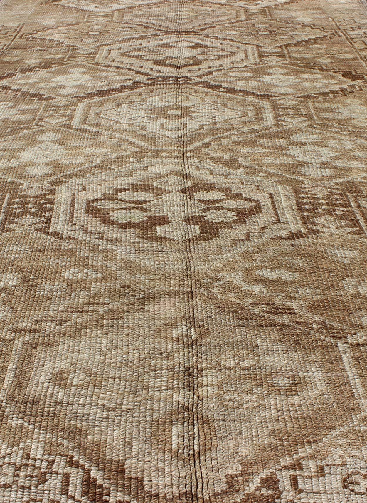 Mid-20th Century Cream and Tan Brown Vintage Turkish Oushak Runner with All-Over Diamond Design For Sale