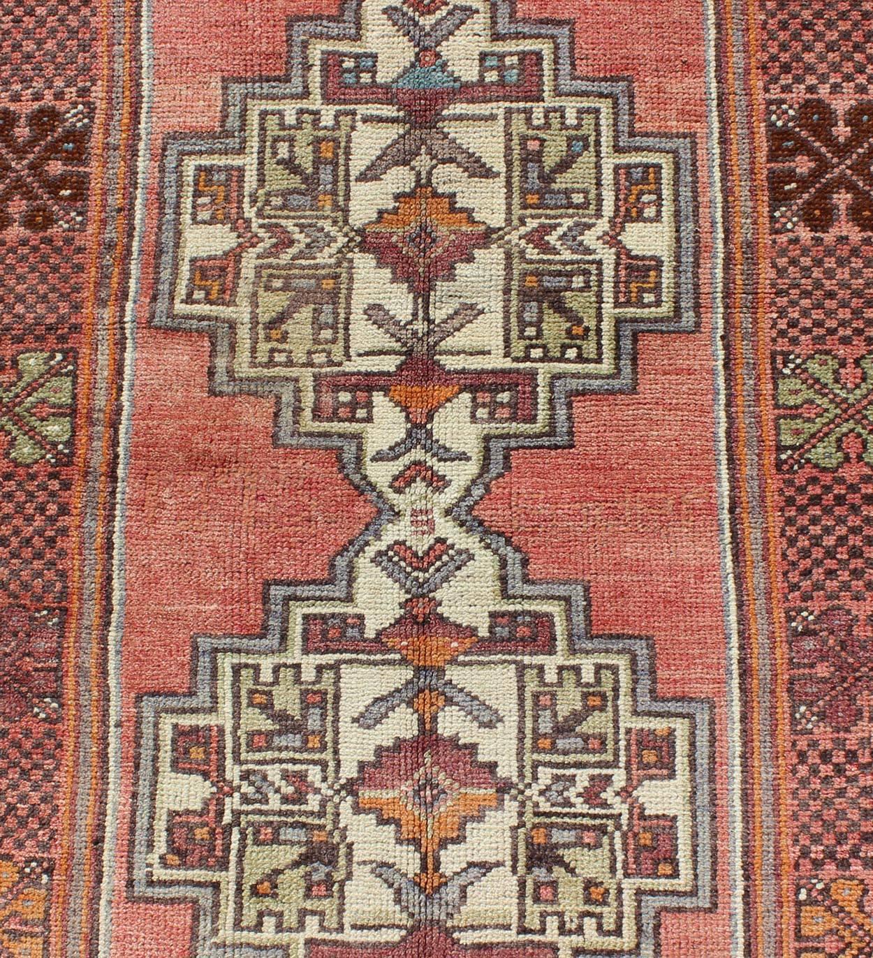 Wool Soft Red and Green Vintage Turkish Oushak Rug with Sub-Geometric Dual Medallions For Sale
