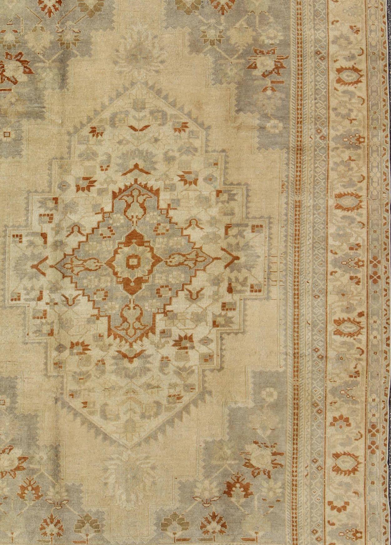 Floral Layered Medallion Vintage Turkish Oushak Rug in Cream, Ivory, Gray & Red In Excellent Condition For Sale In Atlanta, GA