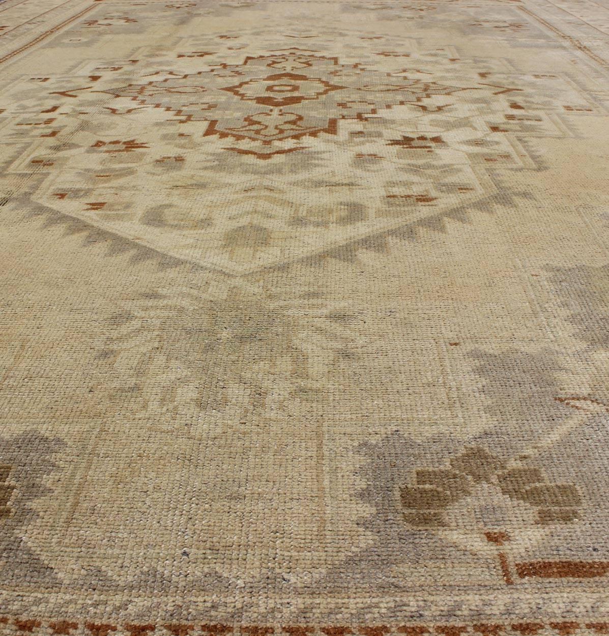 Wool Floral Layered Medallion Vintage Turkish Oushak Rug in Cream, Ivory, Gray & Red For Sale