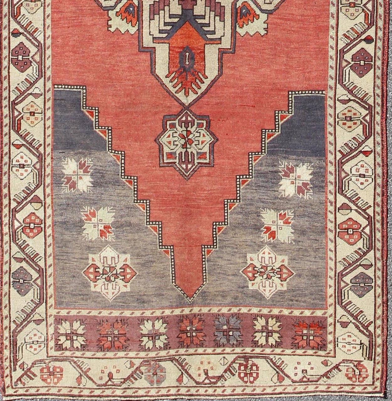  Vintage Turkish Oushak Gallery runner with geometric dual medallions in Light Green, soft coral red, gray, ivory, Keivan Woven Arts/ rug/ TU-TRS-34562, country of origin / type: Turkey / Oushak, circa 1940

Measures: 5'3 x 14'10. 

This Turkish