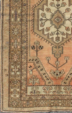 Vintage Turkish Oushak Rug in Soft Apricot, Ivory, and Brown with Medallions