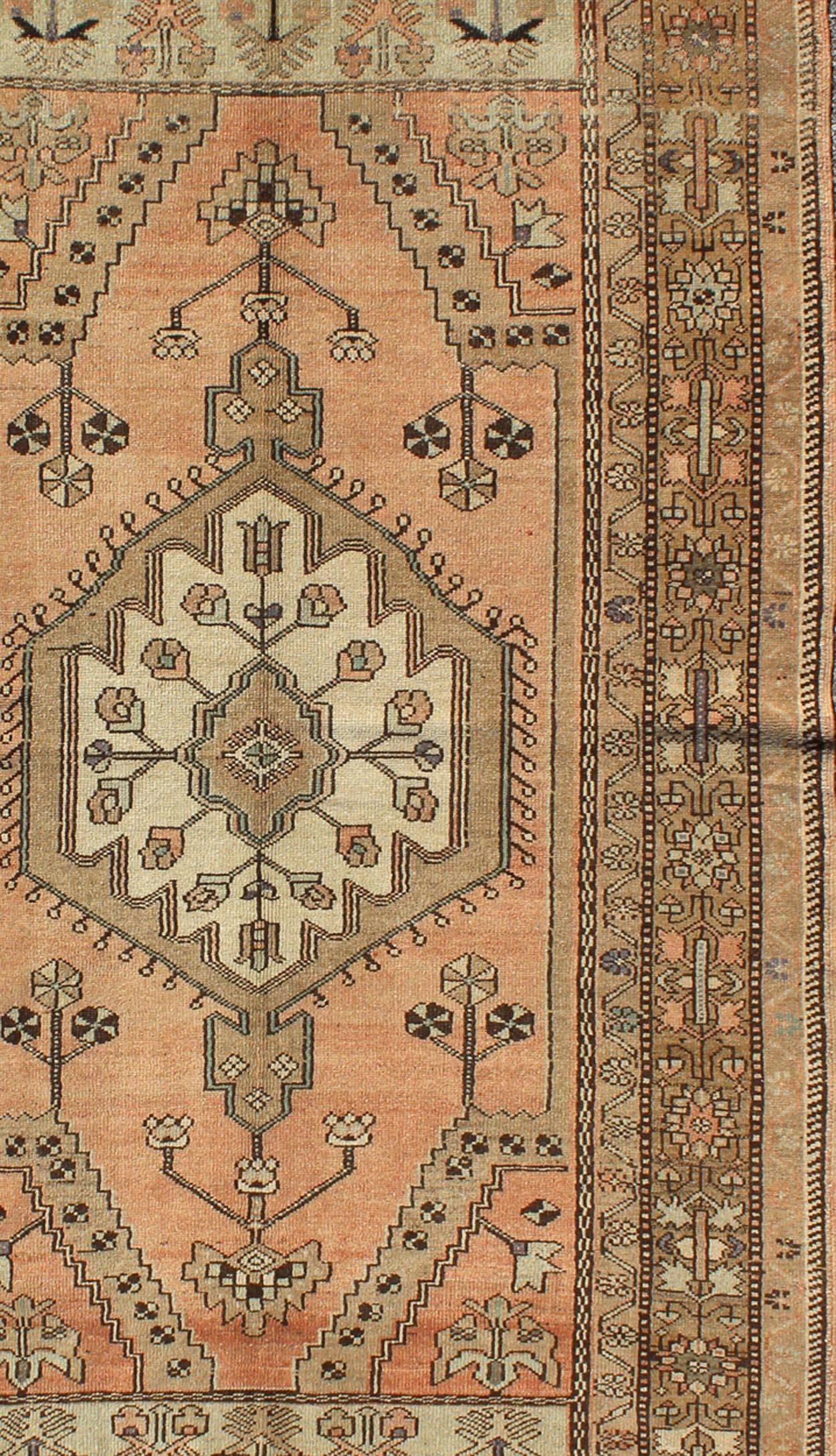 Hand-Knotted Peach Colored Floral Vintage Turkish Oushak Rug with Multiple Ornate Borders For Sale