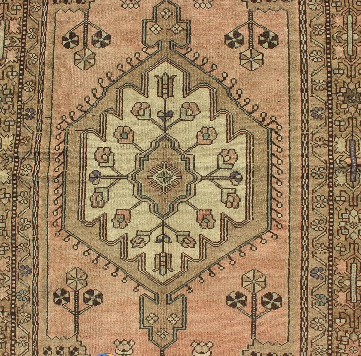 Vintage Turkish Oushak Rug in Soft Apricot, Ivory, and Brown with Medallions In Good Condition For Sale In Atlanta, GA