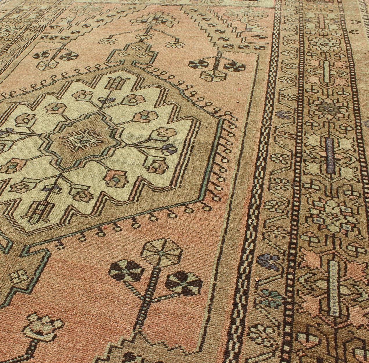 Mid-20th Century Peach Colored Floral Vintage Turkish Oushak Rug with Multiple Ornate Borders For Sale