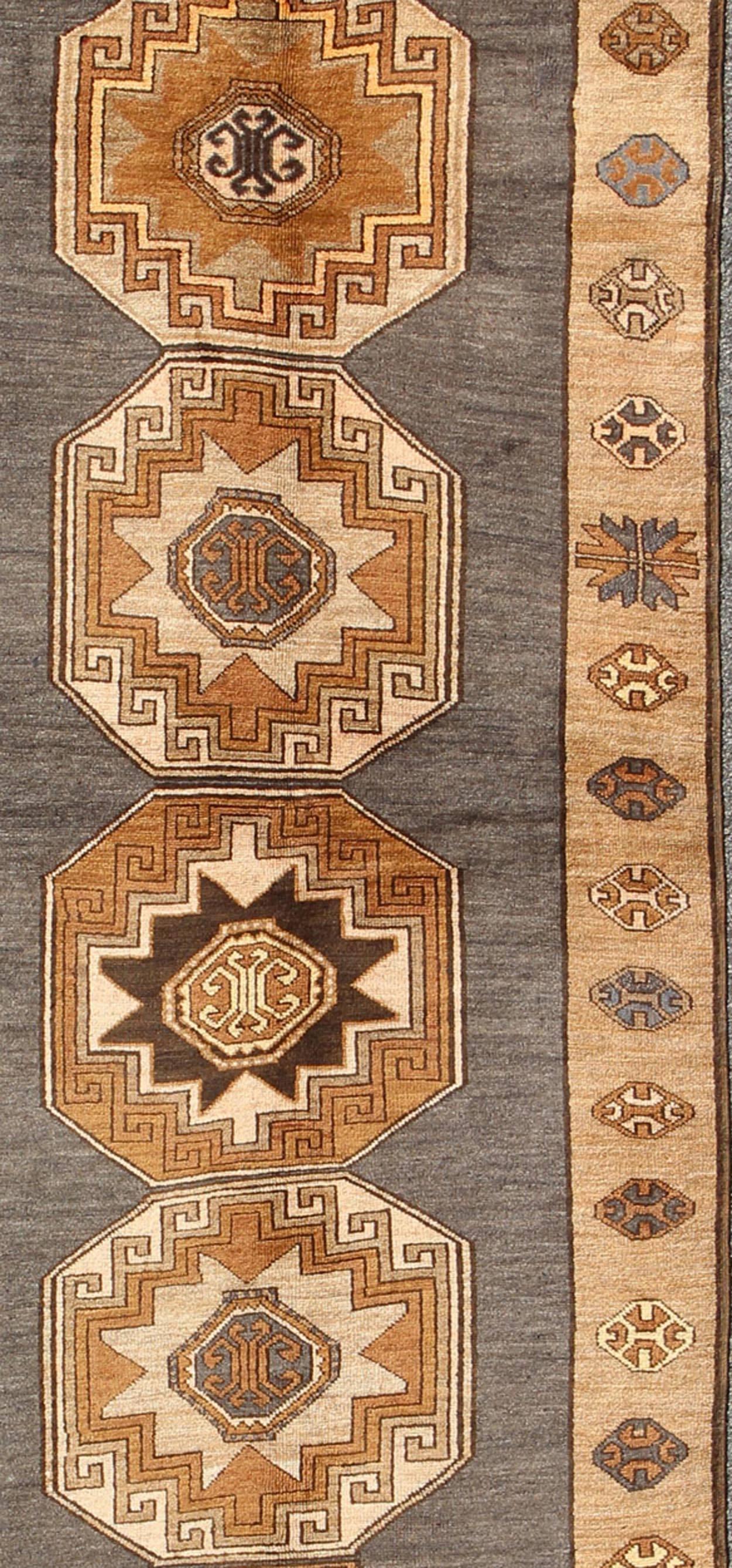 Shades of Brown Vintage Turkish Oushak Runner with Vertical Medallion Design In Excellent Condition For Sale In Atlanta, GA