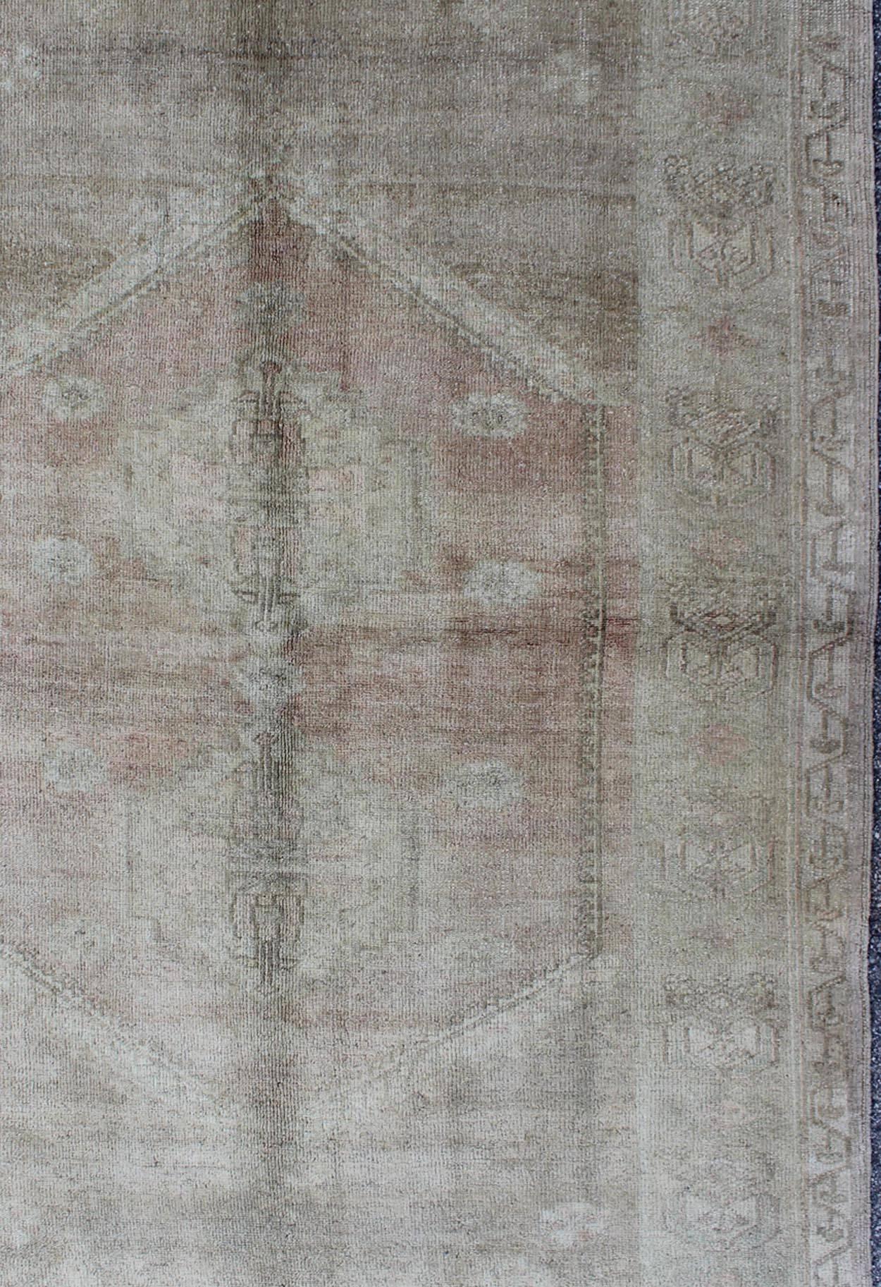 Faded Vintage Turkish Oushak Rug with Central Medallion in Gray and Berry In Excellent Condition For Sale In Atlanta, GA