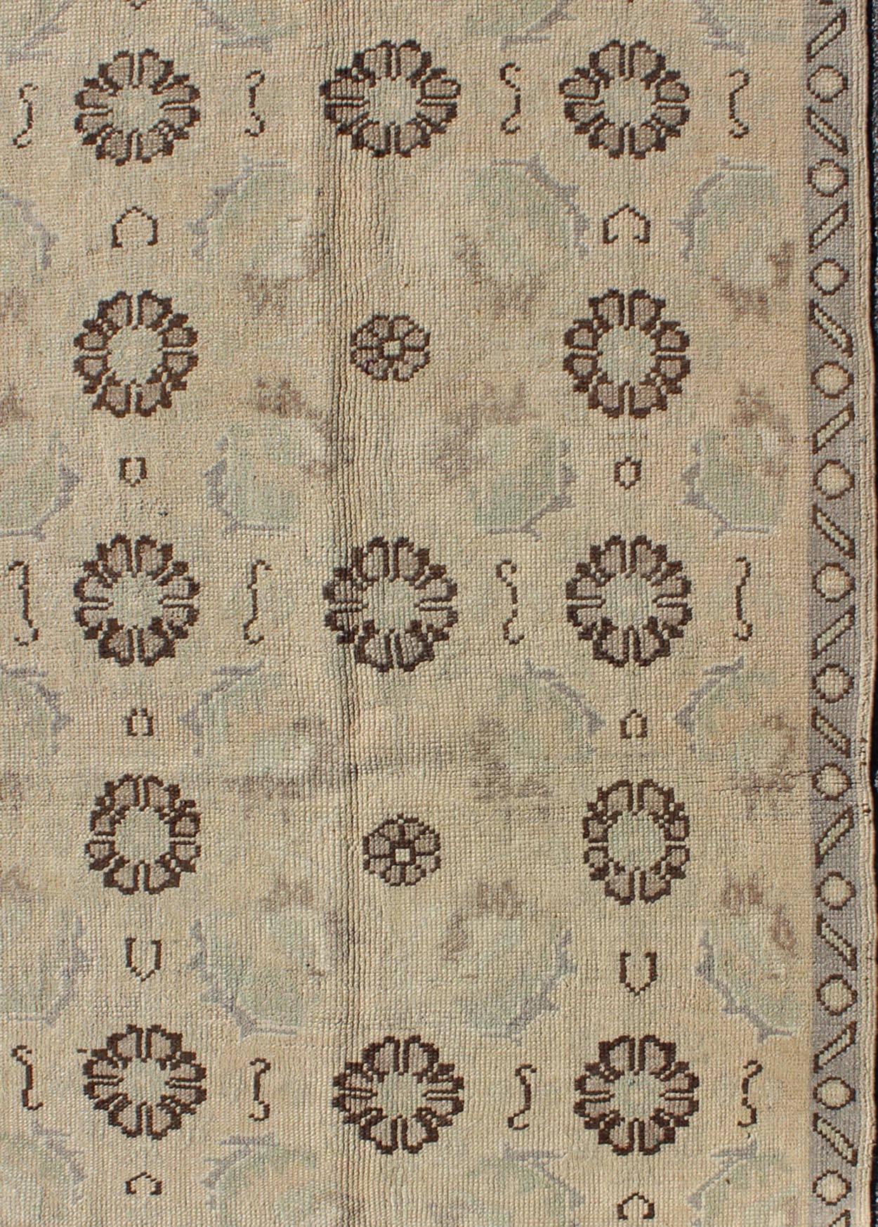 Blossom and Tribal Design Vintage Turkish Oushak Rug in Nude, Taupe, Gray, Brown In Excellent Condition In Atlanta, GA